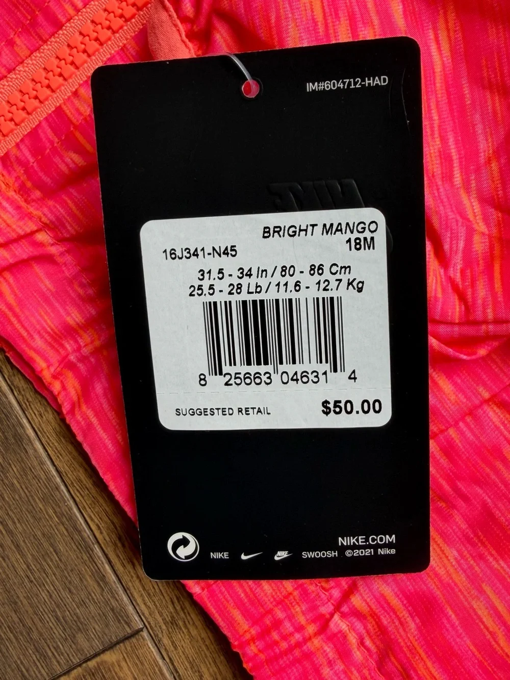 Nike toddler windbreaker in bright mango. 18 month. NWT